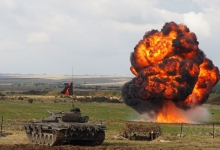 A Hollywood film company was hired to rig pyrotechnic explosions for a mock battle demonstration on Salisbury Plain  Read more: http://www.dailymail.co.uk/news/article-3860116/Are-watching-Putin-British-Army-calls-Hollywood-make-explosions-extra-realistic-strength-against-imaginary-Russian-force.html#ixzz4O6VpNAhP  Follow us: @MailOnline on Twitter | DailyMail on Facebook