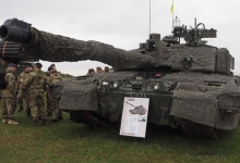 The event was designed to showcase the capabilities of the British army including the fearsome Challenger II main battle tank Read more: http://www.dailymail.co.uk/news/article-3860116/Are-watching-Putin-British-Army-calls-Hollywood-make-explosions-extra-realistic-strength-against-imaginary-Russian-force.html#ixzz4O6VtYdD5 Follow us: @MailOnline on Twitter | DailyMail on Facebook